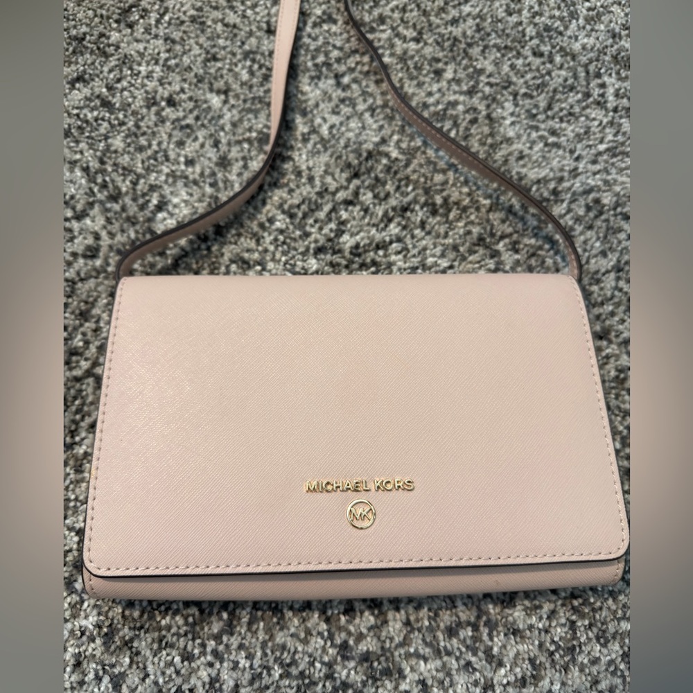 Michael Kora light pink crossbody purse. Small